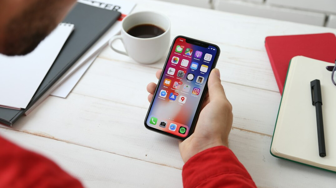 person using insurance app on phone
